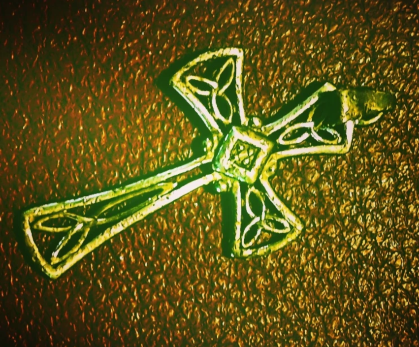 Cross on Bible